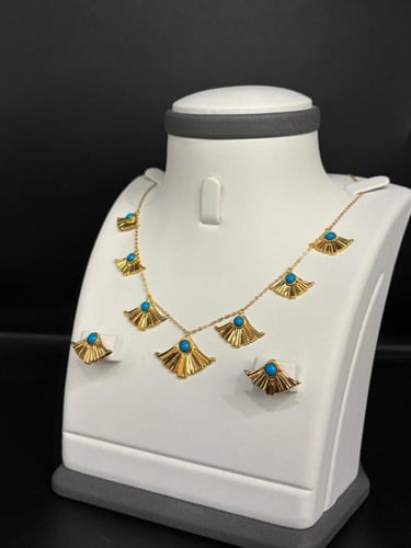 حلق و عقد الفيروزي ذهب عيار21 فاخر و مميز وزن 4.83...