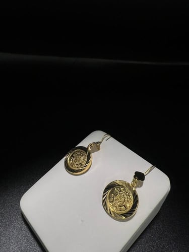 حلق الجنيه ذهب عيار٢١ لبس يومي فاخر و انيق الوزن 3...