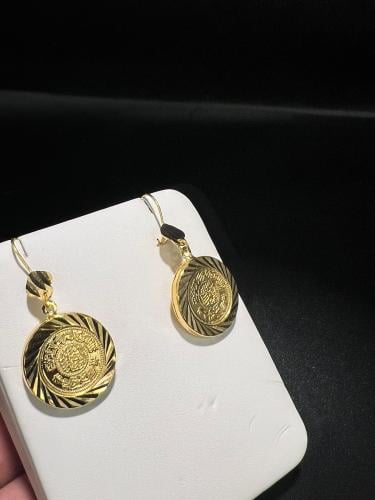 حلق الجنيه ذهب عيار٢١ لبس يومي فاخر و انيق الوزن 3...