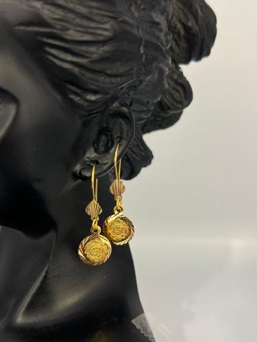 حلق موديل الجنيه ذهب عيار21 انيق و لبس يومي بوابة....