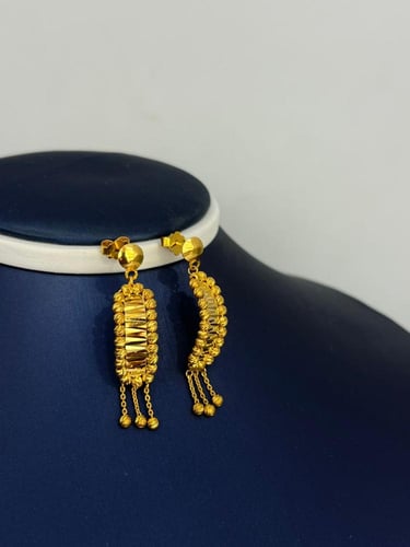 حلق دوريكا ذهب عيار 21 بتصميم أنيق وزن 4.74 جرام