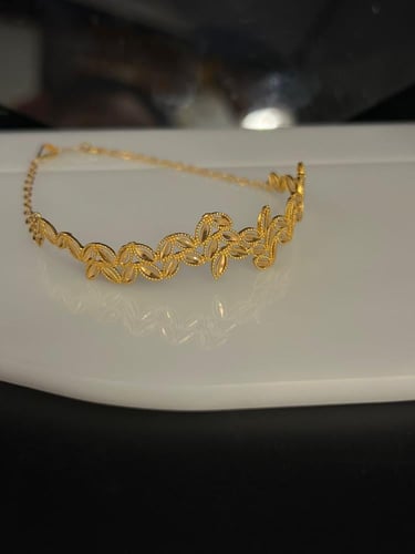 سوارة غصن الزيتون ذهب عيار21 فاخره و انيقه فري ساي...