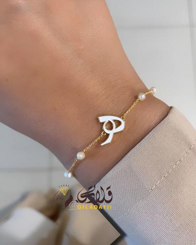 اسواره الحرف العربي ابيض ذهبي