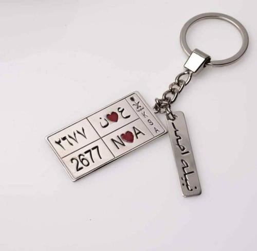 ميداليه مفتاح بشكل لوحة