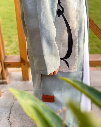 دقلة اطفال بتصميم حصري مع كتابة الاسم