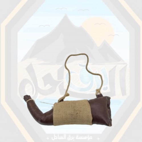 ميداليه على شكل قربة ماء