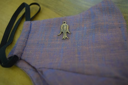 اضافة اكسسوار معدني للكمامة