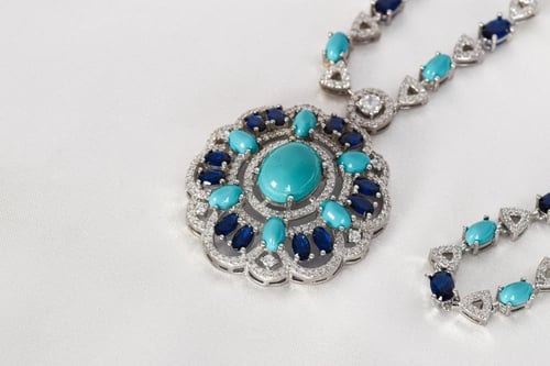 طقم السحر الملكي – فضة 925 بأحجار تركواز وزرقاء بت...