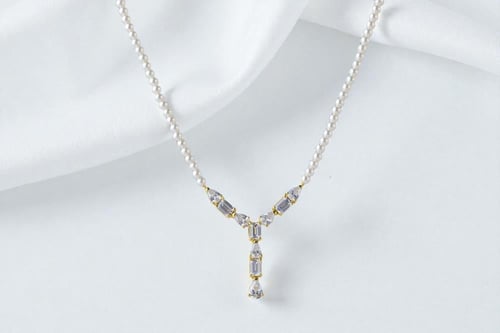 طقم لؤلؤ ذهبي من الفضة الخالصة