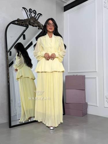 فستان بطبقتين بتدخيلة لول من الصدر