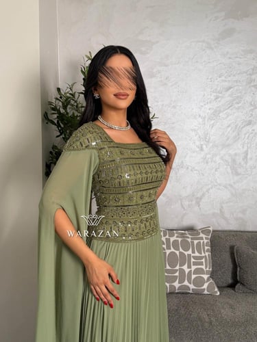 فستان ملكي بكسرات وبتطريز شك يدوي