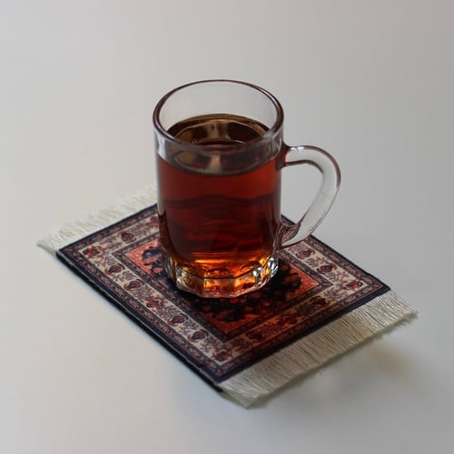 قاعدة كوب سجاد اسود