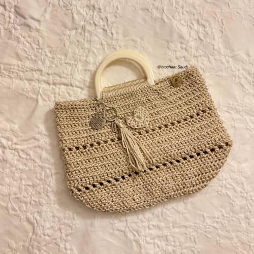 شنطة يد ذهبي