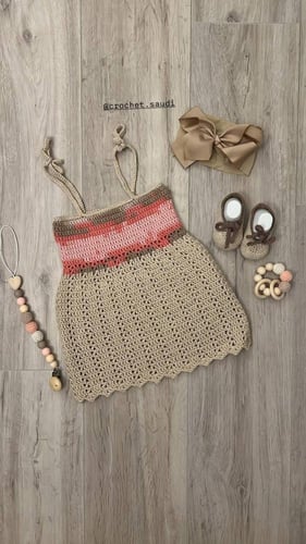 فستان وردي وبيج مواليد