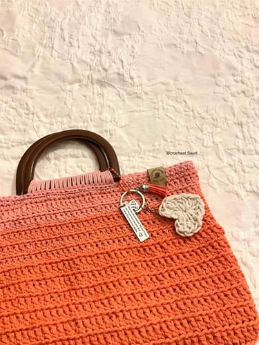 شنطة يد برتقالي