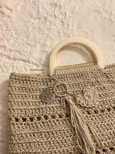 شنطة يد ذهبي