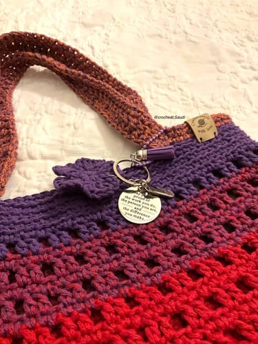 شنطة أحمر وبنفسجي