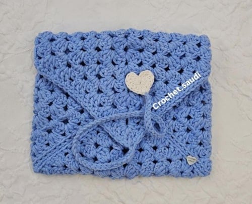 شنطة آيباد أو كتاب