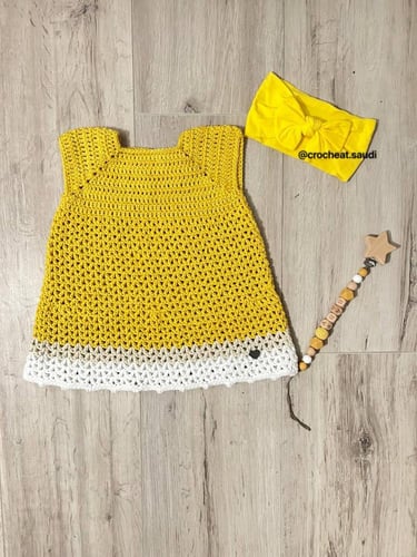 فستان أصفر للمواليد