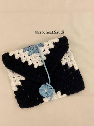 شنطة آيباد أو كتاب