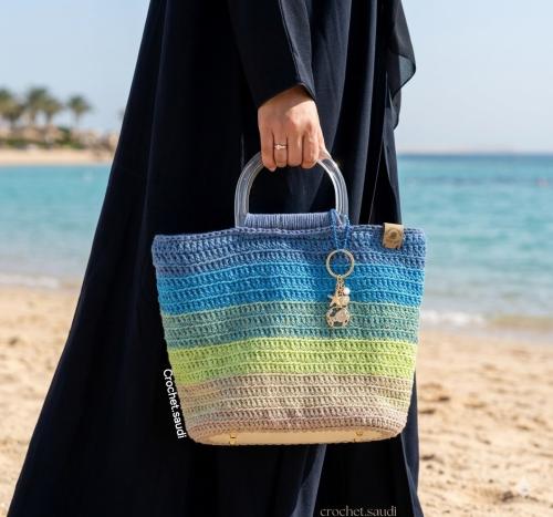 شنطة يد لون المحيط