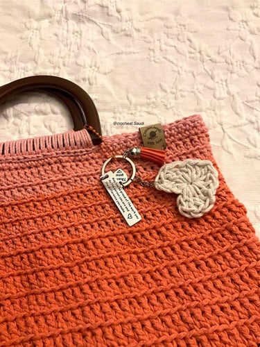 شنطة يد برتقالي