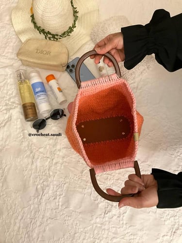 شنطة يد برتقالي