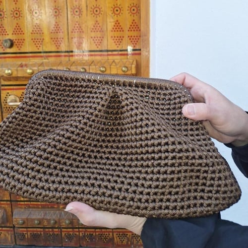 شنطة يد بنية