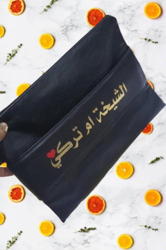 شنطة يد باوتش جلد محبب اسود 30 * 22 سم
