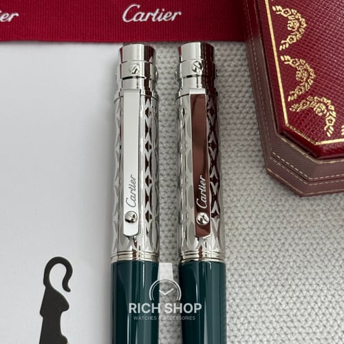 قلم كارتير سانتوس فضي على اخضر مزخرف