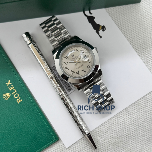 طقم ساعة رولكس نحاسي مع قلم كارتير نحيف مزخرف