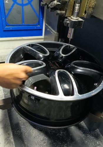 Repair of 18-inch rim including tax