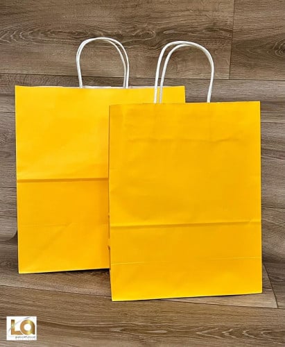 كيس ورقي بيد اصفر مقاس 32×25×12 كرتون 200 كيس