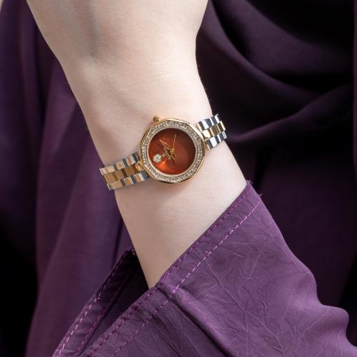 ساعة نسائية ستيل فضي وذهبي بإطار مرصع - تصميم راقي