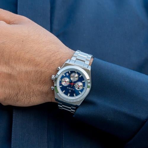 ساعة رجالية بسير ستيل فضي وميناء أزرق وأبيض – تصمي...