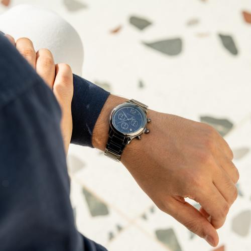 ساعة رجالية بسير ستيل أسود وميناء كحلي داكن – إطلا...