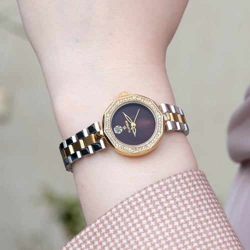 ساعة نسائية ستيل فضي وذهبي بإطار مرصع - تصميم راقي