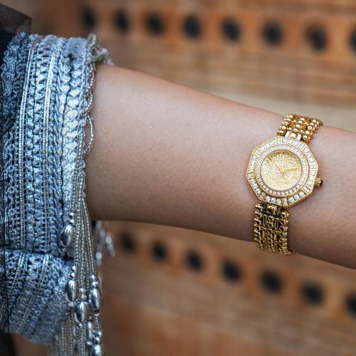 ساعة جنيه نسائية بسير ستيل بلون ذهبي