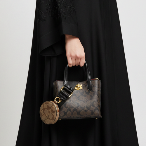 شنطة يد نسائية جلد بإطلالة فخمة - بني وأسود