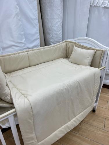 مفرش جوانب سرير الطفل