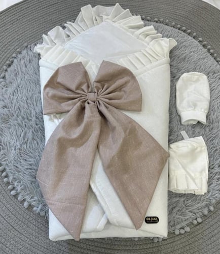 مدس مواليد كتان على فيونكه