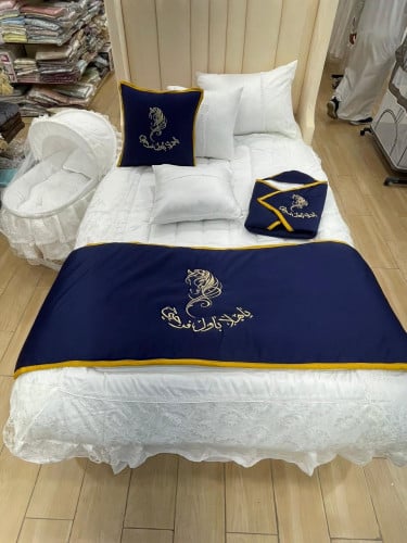 طقم مفرش نفاس بتطريز الاسم