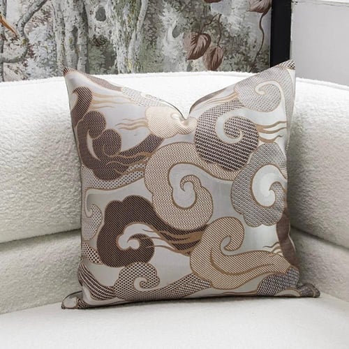 غطاء وسادة رمادي و ذهبي