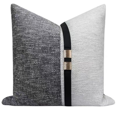 غطاء وسادة رمادي وابيض متوفر بحزام ذهبي وفضي