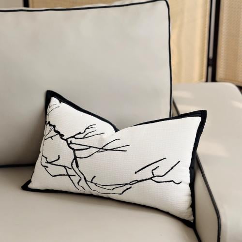 غطاء وسادة ابيض و اسود