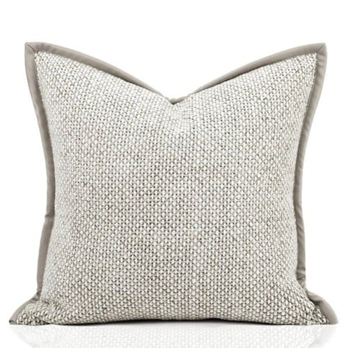 غطاء خدادية بيج بنسيج ناعم وحواف جلد رمادي