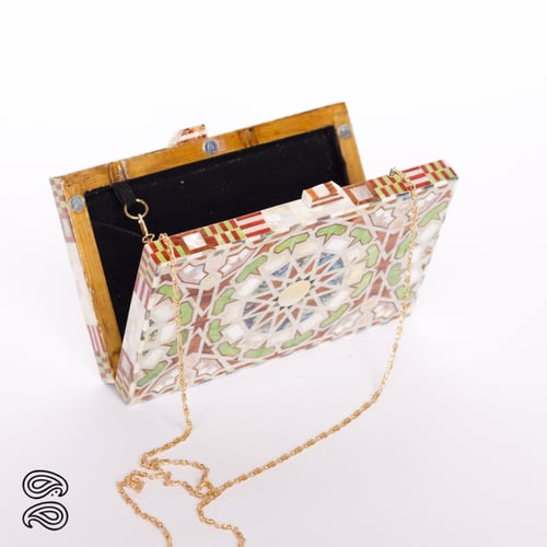 حقيبة الصدف والاكريلك