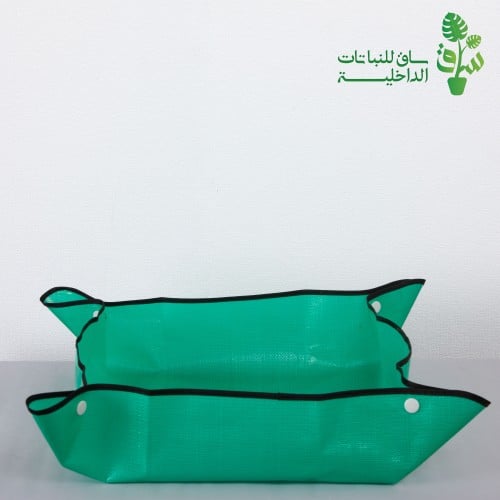 مفرش لتغيير تربة النباتات (قابل للطي)