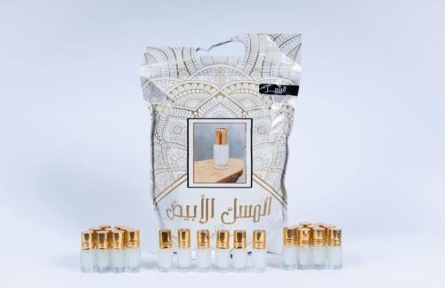 مسك توزيعات ربع تولة مع المغلف