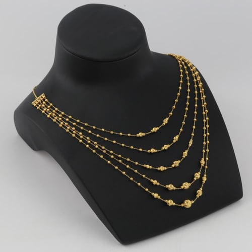 طقم ذهب اربع ادوار كرات الليزر - عيار 21